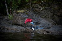Utøyaisland, Norway, 22 July 2011. On 22 July, Anders Behring Breivik(32) killed 69 people on the small island of Utøya, 40 kilometers northwest of Oslo, in Norway. The shootings formed the second of two sequential attacks, the first being a car-bomb explosion in the government quarter of the capital, which killed eight people and injured 92. The Utøyaincident took place less than two hours later. The island is the site of an annual summer camp organized by the youth division of the Norwegian Labor Party. Breivik gained access by posing as a police officer who had come to conduct a routine check following the Oslo bombing. He went on to shoot indiscriminately, killing and injuring people around the island and firing on those who jumped into the water in an attempt to escape. Local police did not have a helicopter appropriate for transporting groups of officers, and could not find a suitable boat to reach the island. When anti-terror police arrived from Oslo, they were eventually carried over to Utøyaon civilian craft, reaching the island an hour after the first shots had been fired. Breivik was arrested, and later put on terrorist charges for both attacks. Breivik, who admitted carrying out both the bombing and the shooting, had been preparing for the attacks for a number of years, and had distributed a manifesto outlining his extremist beliefs. © Niclas Hammarström, Schweden, Aftonbladet
